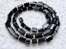 Black tourmaline rough beads. 10/7 mm 16 inches strand