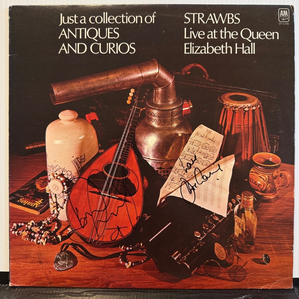 A hand-signed vinyl from Strawbs — a deeply underrated British prog-folk band — autographed by Cousins & Hooper, making it a rare collector's piece for the discerning music nerd.