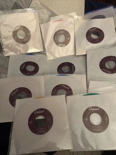 BEATLES - 45RPM  COLOR VINYL RECORDS - CAPITOL RECORDS - FOR JUKEBOXES ONLY MINT
