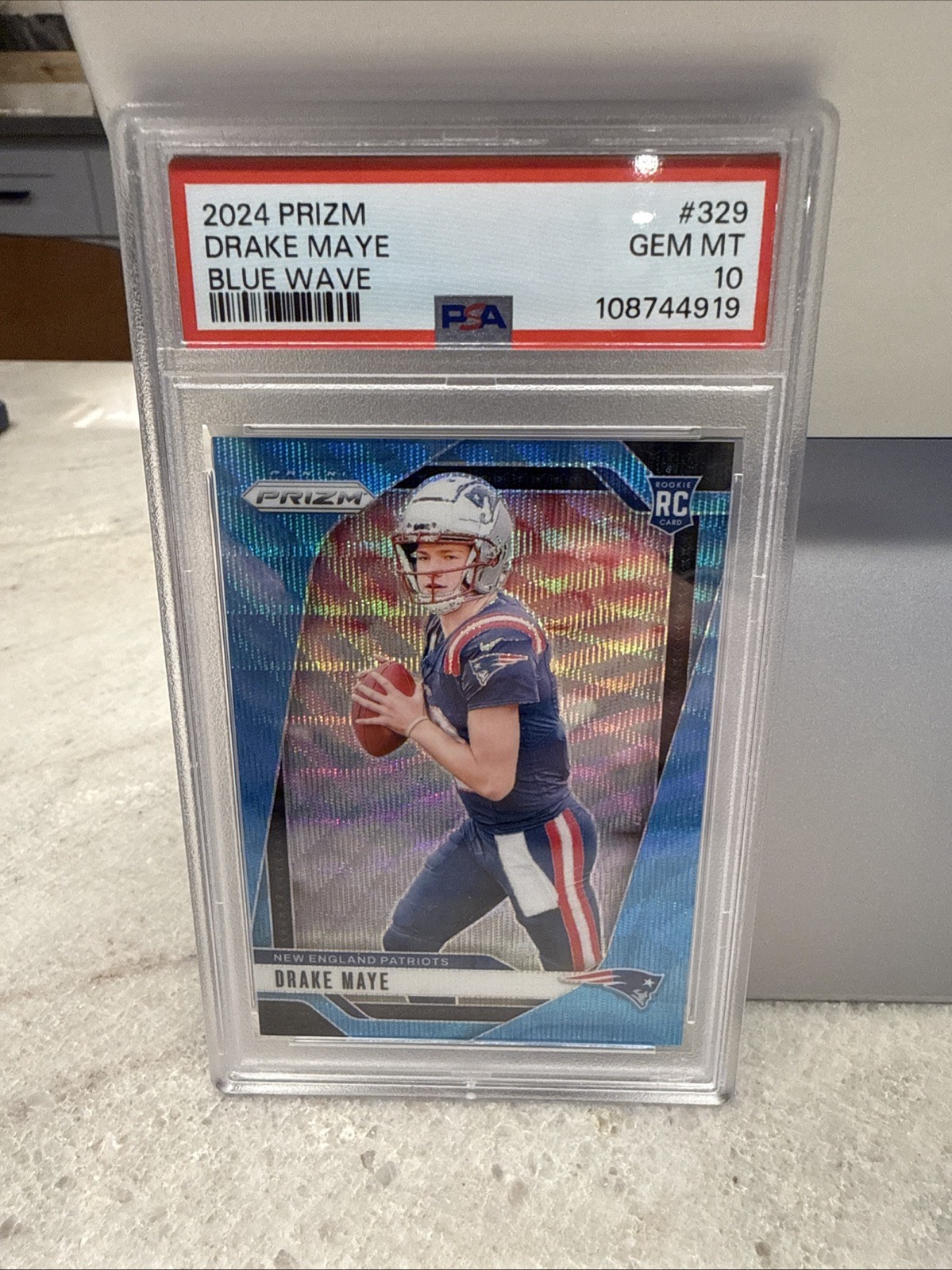 2024 Panini Prizm - Rookies Drake Maye #329 Blue Wave Prizm /230 (RC) PSA 10