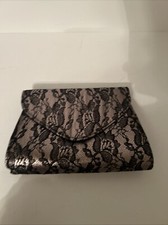 Clutch By Neiman Marcus Metallic Lace with removable strap ImExcellent Condition