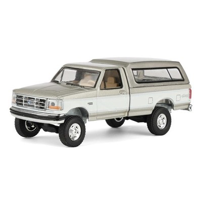 Greenlight 1/64 1997 Ford F-250 4x4 Truck Rick's Auto Sales LP