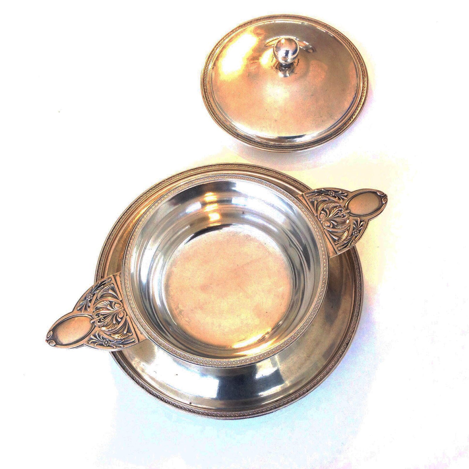 AN ANTIQUE SMALL SOLID SILVER WARMING DISH OR SAUCE BOWL PRODUCED BY