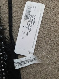 BRAND NEW LISE CHARMEL , BLACK & WHITE STRING THONG SIZE LARGE 