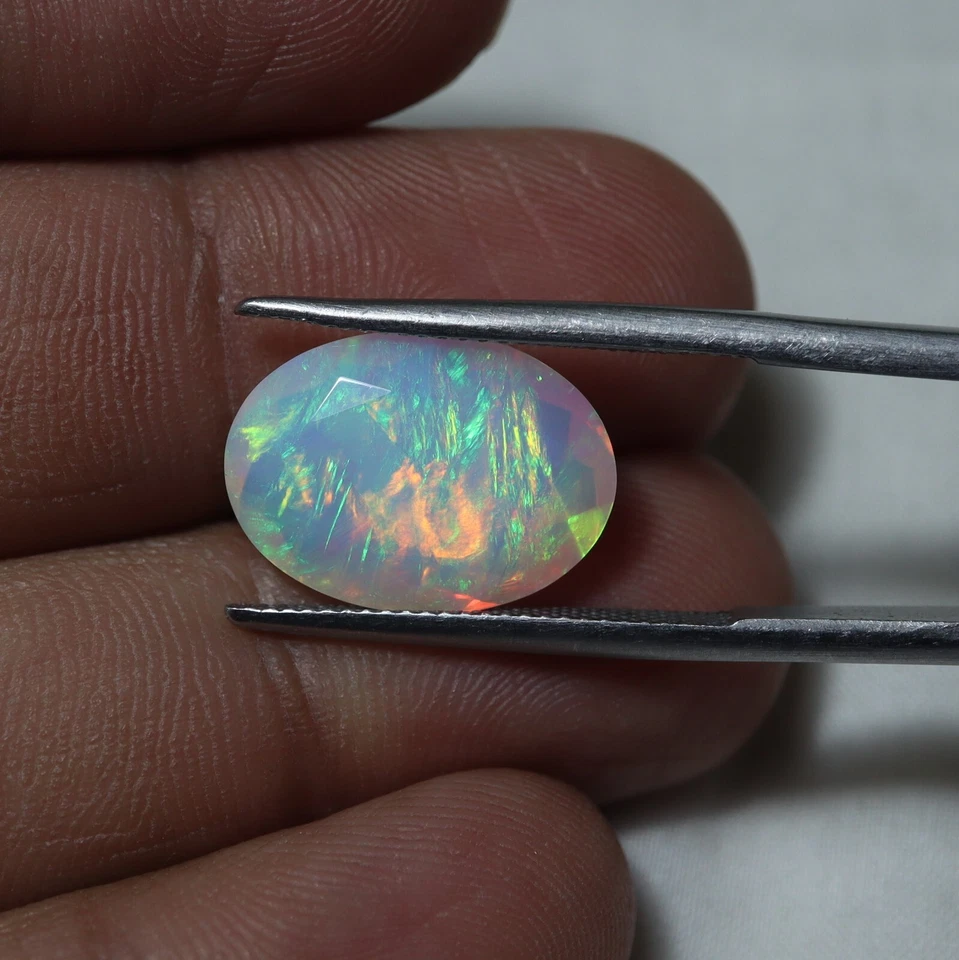 5,5 quilates 16,4 x 12 x 6,5 mm natural AAA verde amarillo fuego ópalo etíope corte ovalado Foto 4 de 4