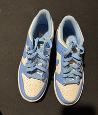 Nike Dunk Low UNC blue and white sneakers.