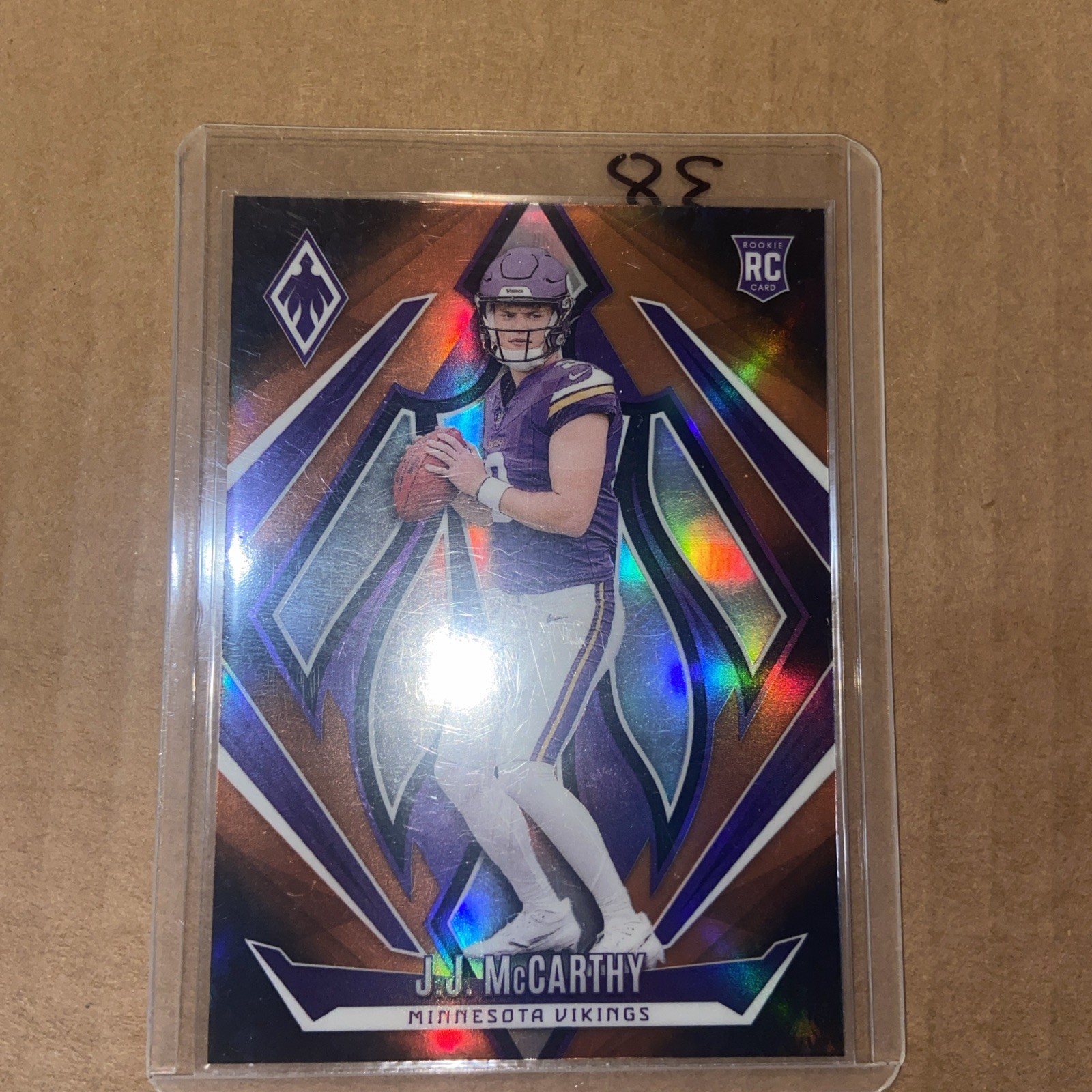 2024 Panini Phoenix - Rookies J.J. McCarthy #185 Orange Fade (RC)
