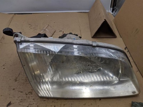 Used Right Headlight Assembly fits: 2000 Mazda 626 Right Grade A