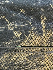 2 Remnants Copper/Black snake skin fabric. 40  x 44  piece and a 20  x 26  piece