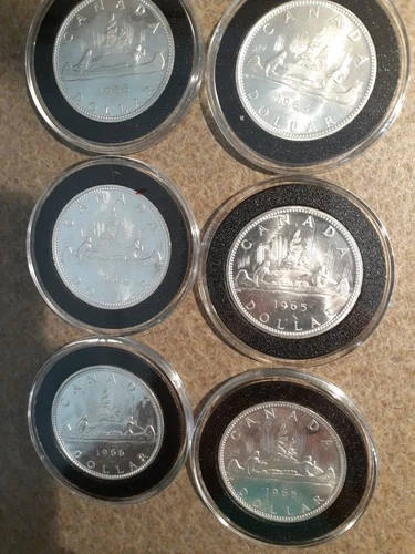 1965-1966 Canada Silver Dollar Uncirculated Voyager Canoe With Natives. 6 Coins