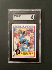 1984 Topps #36 USFL Gamblers Jim Kelly Rookie Card SGC 8 NICE CARD. rookie card picture