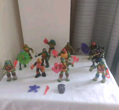 TMNT Figuren Konvolut Teenage Mutant Ninja Turtles X12 One Spins + Zubehör    