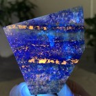 158G Natural lapis lazuli mineral flaky crystal under UV light — photo 6