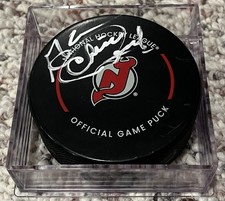 GLENN “CHICO” RESCH signed New Jersey Devils Official Game Puck NHL autograph