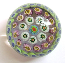 A VINTAGE BACCARAT MEDIUM STAR CUT BASE MILLEFIORE PAPERWEIGHT (12386)