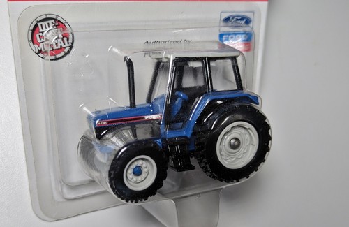 1/64 Ford 8240 Tractor w/cab, 4WD, New on card - Picture 2 of 3