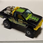Vintage Hot Wheels Black Nissan Hardbody 1/64 Diecast Race Truck — photo 2