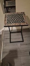 Lovely versatile brown and black metal side table for sale.