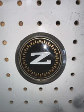 1984-1989 Nissan 300ZX Z31 FRONT BUMPER EMBLEM BADGE Z LOGO SIGN DECAL PLATE OEM