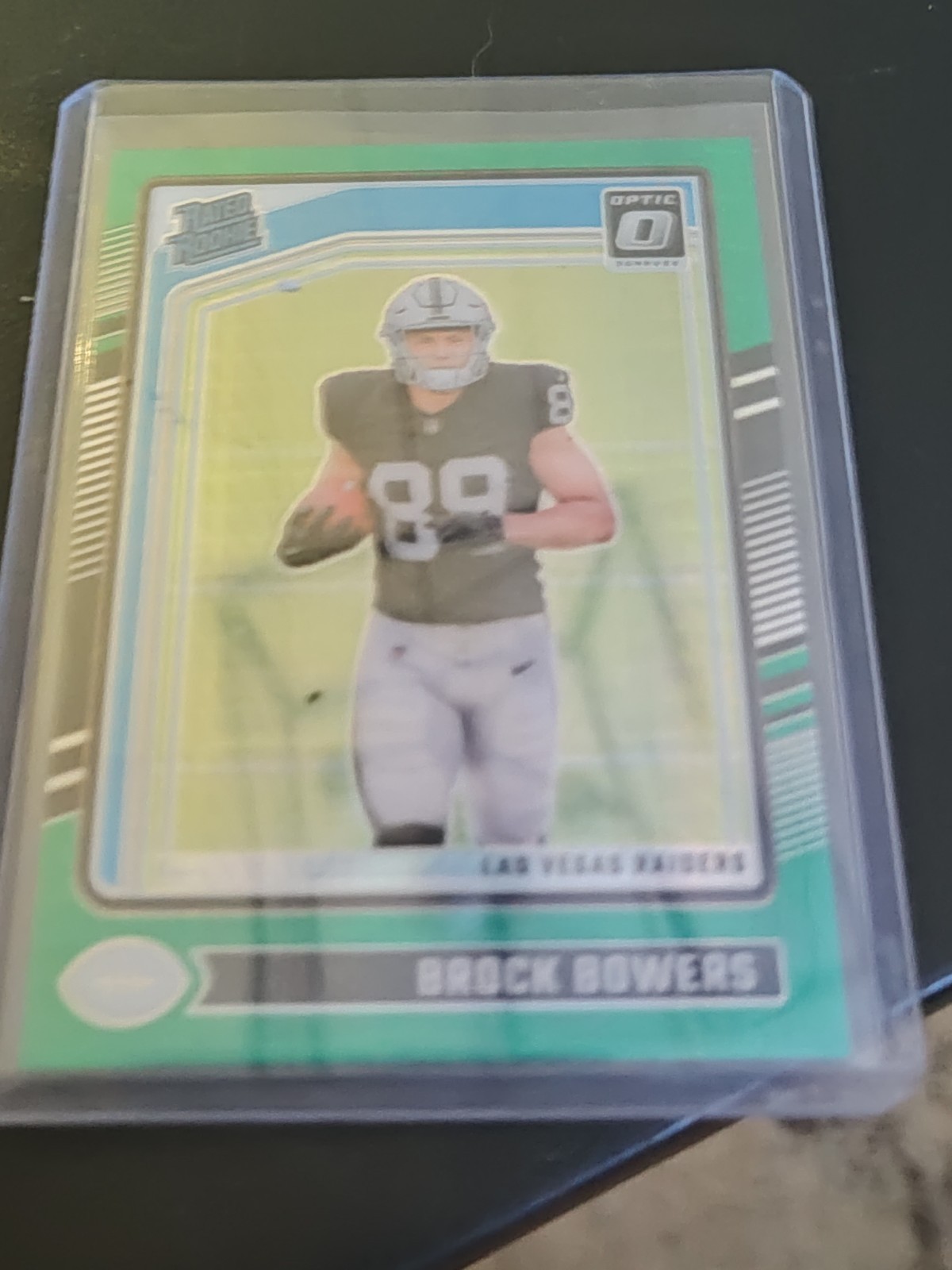 2024 Panini Donruss Optic Rated Rookie Brock Bowers #215 Green Hyper Prizm