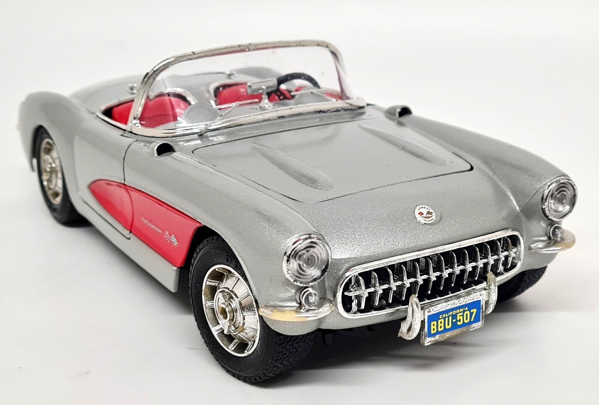 Chevrolet: A Bburago 1:18 Scale 1957 Chevrolet Corvette (cod.3024) In Metallic Silver With Red Coves