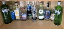10 Empty Gin Bottles for Recycling Rinsed and dried out.