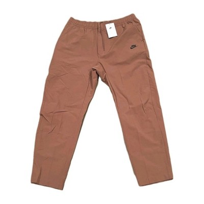 NIKE SPORTSWEAR COMMUTER PANTS MENS SZ MEDIUM TECH WOVEN BRITISH TAN DM6621 281