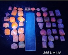 45 pieces Tenebrescent UV reactive fluorescent Hackmanite cabochons 850 carats