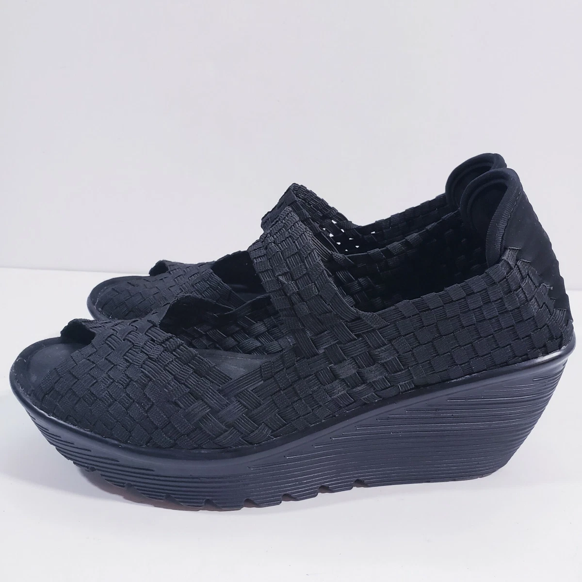 Skechers black wedge shoes hotsell
