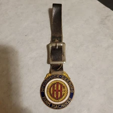 early IHC McCORMICK DEERING FARM MACHINES enamel inlaid original watch fob