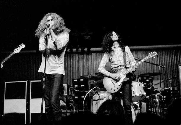 Robert Plant And Jimmy Page From Led Zeppelin Perform Old Music Photo