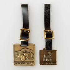 2 Vintage CATERPILLAR BRASS Watch Key FOBS Loader Dump Truck Collectables MINT 
