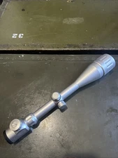 Tasco 6-24x50 AOE Red/Green Illuminated Reticule Scope. Silver Finish.