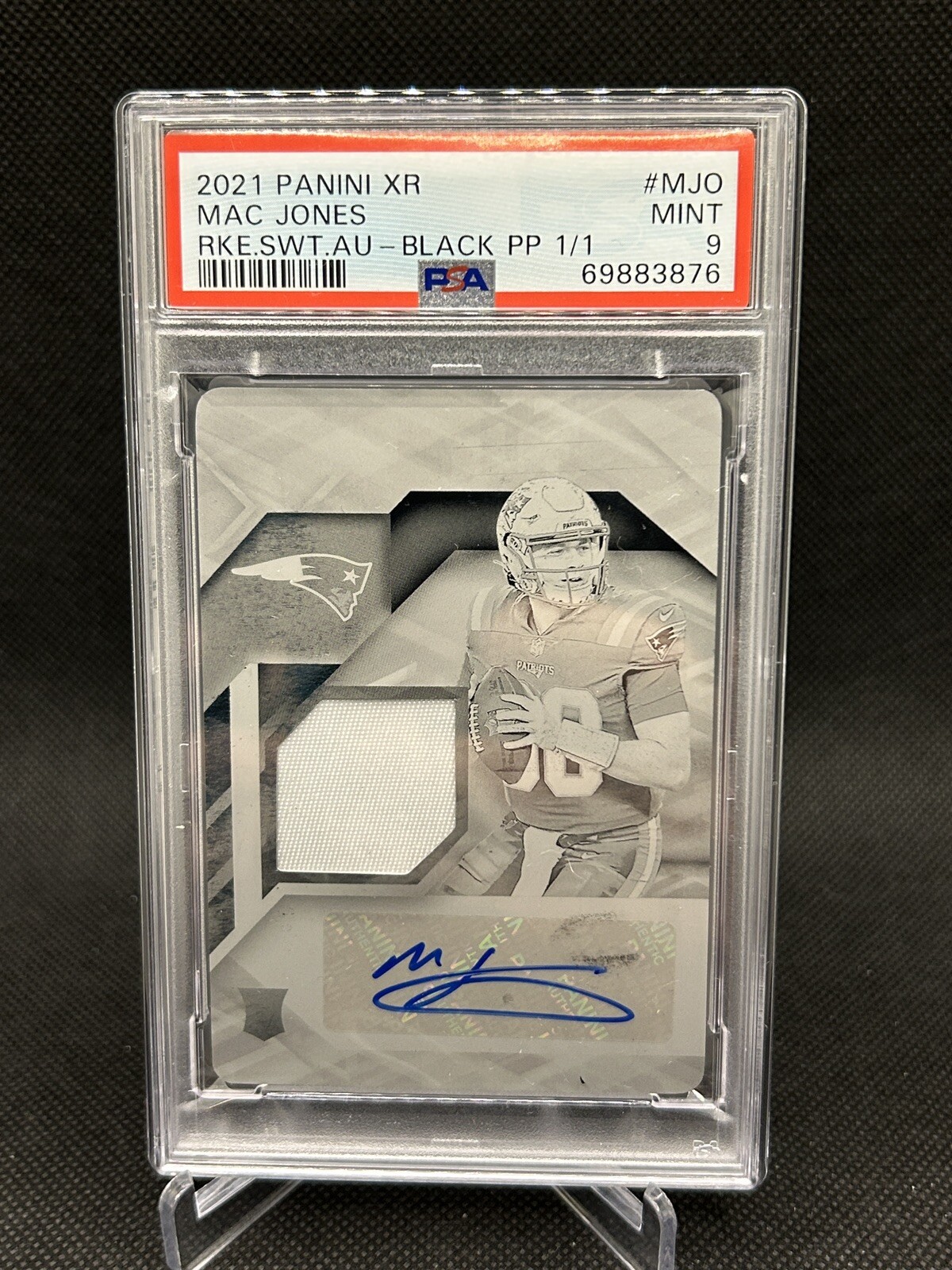 Mac Jones Panini XR Rookie Swatch Autographs #MJO Black Printing Plate 1/1