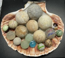 Antique , vintage and Victorian marbles . Found in the river Thames in London .