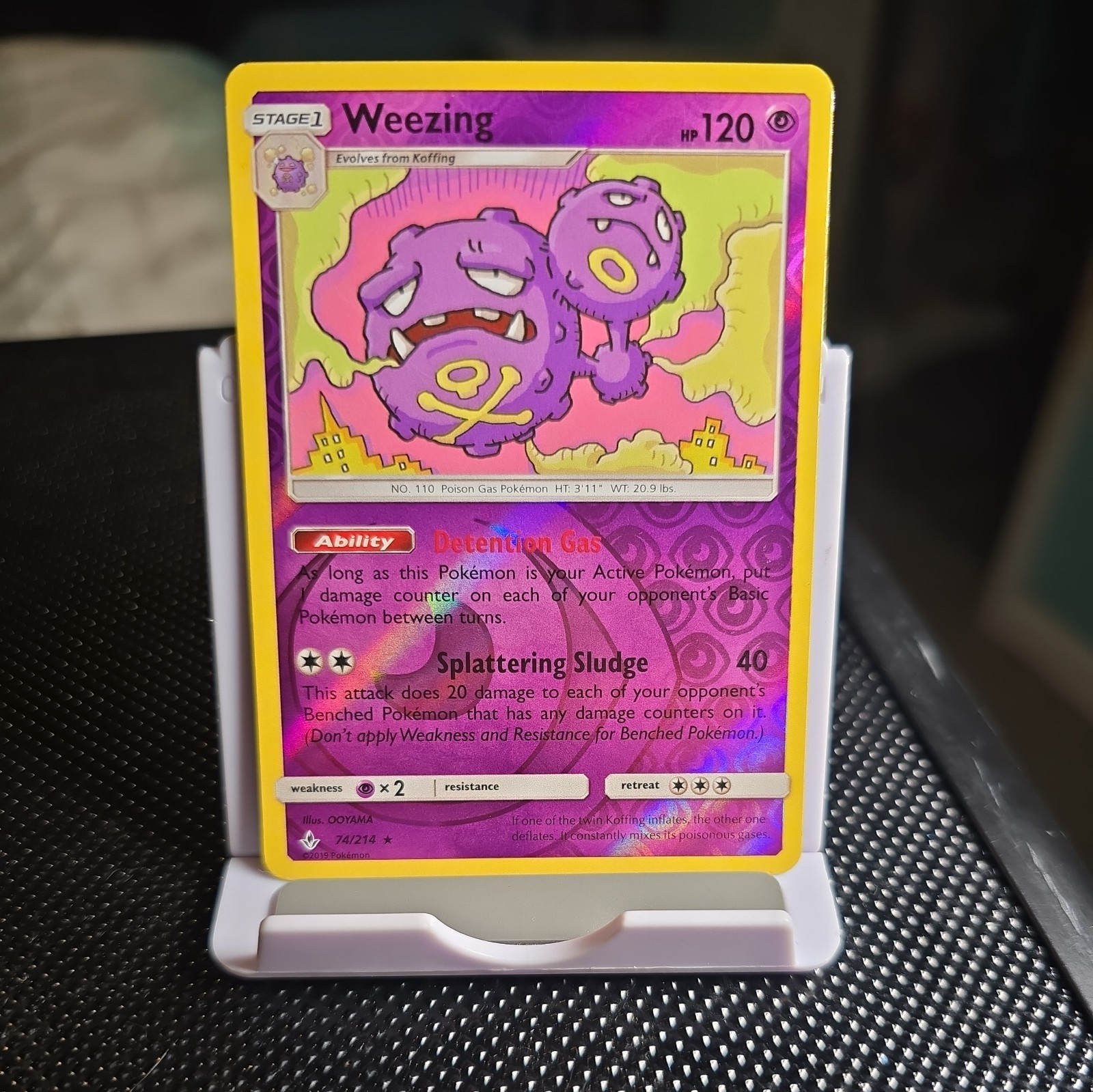 Weezing 74/214 Sm-Unbroken Bonds Reverse Holo