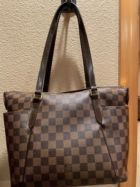 Authentic Louis Vuitton 'Squares' zipper closure handbag