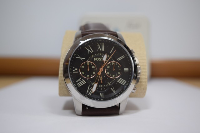 fossil ticker watches