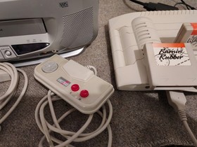 Console GX 4000 - Amstrad GX4000 2 manettes et 2 Jeux burning rubber Robocop 2