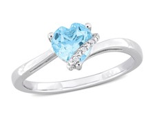 1.00 Carat ctw Sky-Blue Topaz Heart Ring in Sterling Silver with Accent Diamon