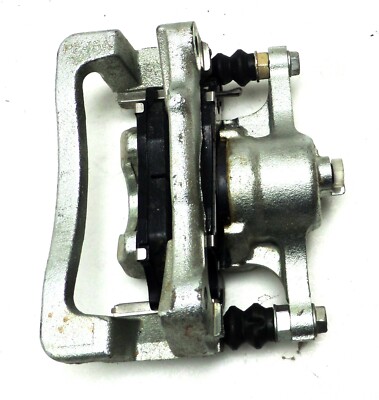New NOS GM Rear Brake Caliper with Brake Pads, Wear Indicator 2006-10 Hummer H3T