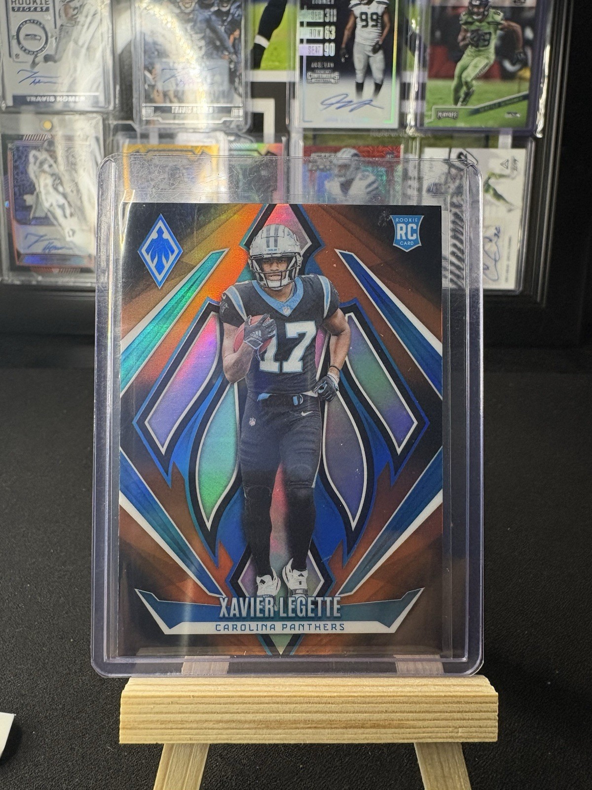 2024 Panini Phoenix - Xavier Legette Rookies Orange Fade #249 (RC) Panthers