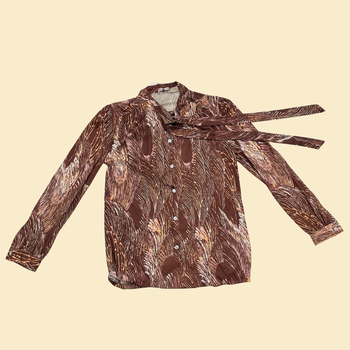 70s size 13/14 patterned blouse with ascot, Fire Islander brown