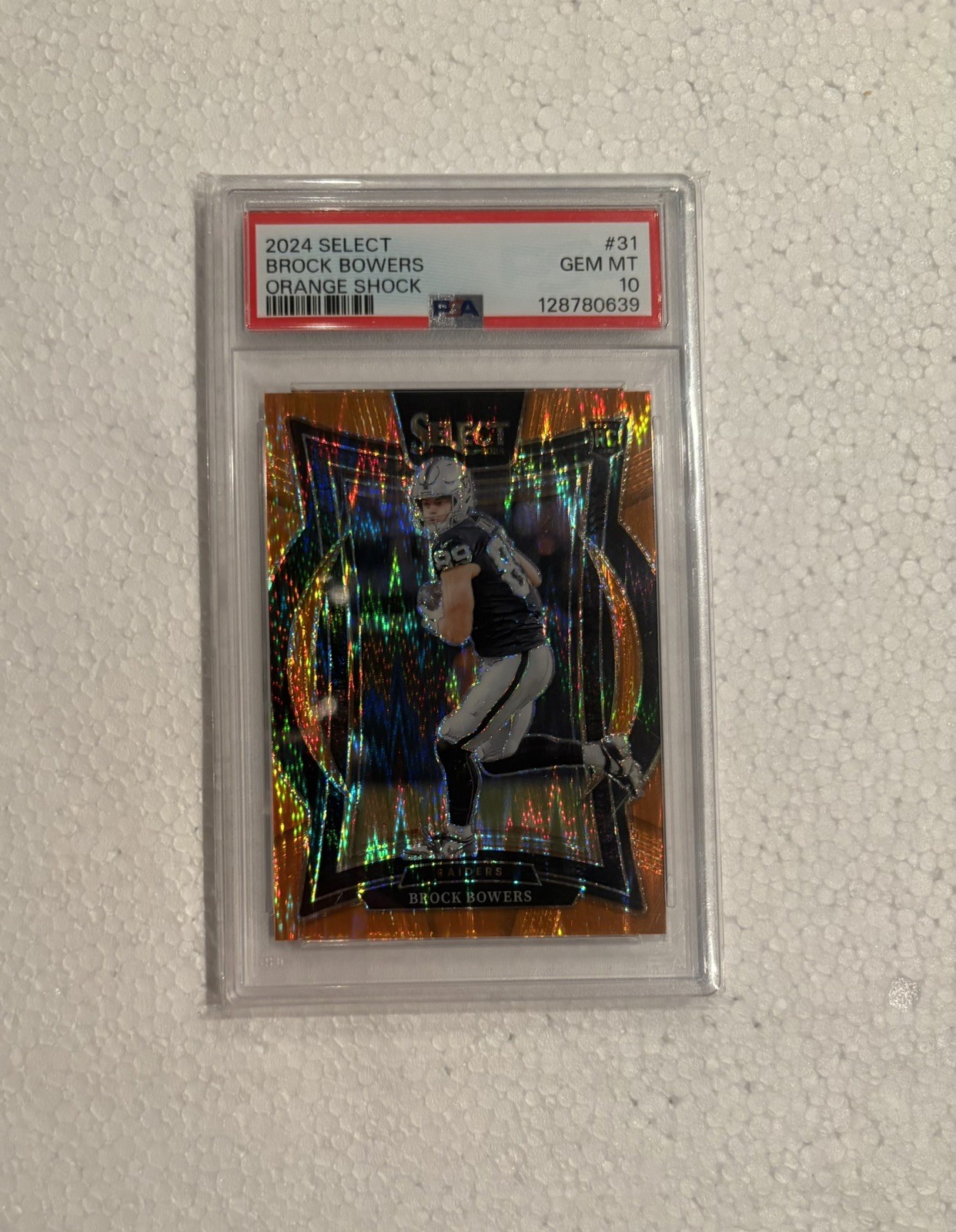 2024 Panini Select - Brock Bowers #31 Orange Shock Prizm /499 (RC) PSA 10