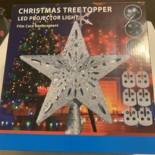 Led Tree Topper, light Projector With Six Slides.  Silver Christmas star.