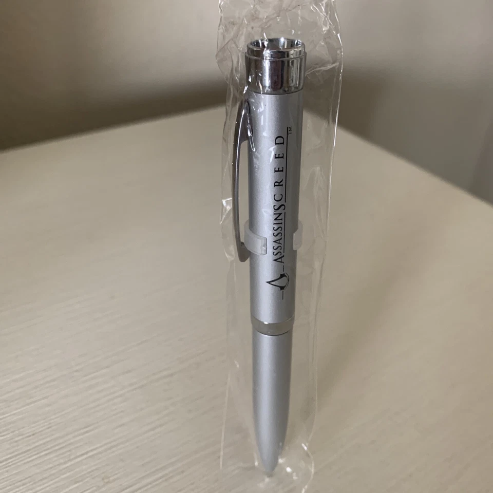 Pluma de luz de proyección con logotipo Assassins Creed 2007 original rara promoción NUEVO Foto 4 de 4