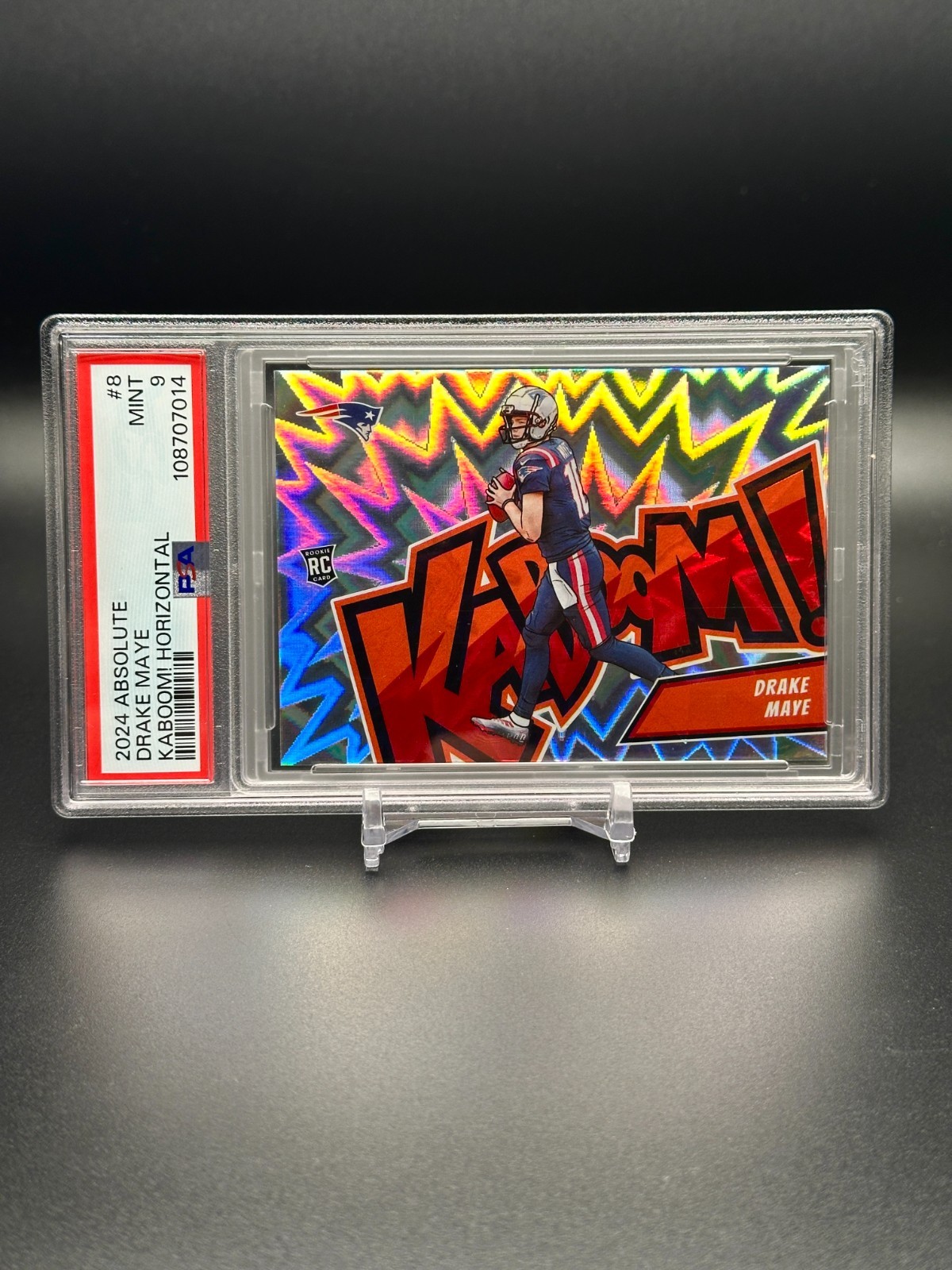 Drake Maye #8 (Football Cards 2024 Panini Absolute Kaboom Horizontal) — is it worth grading?