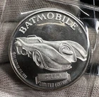 1989 1 OZ SILVER “BATMOBILE” PROOF COIN IN ORIGINAL FACTORY SEAL!