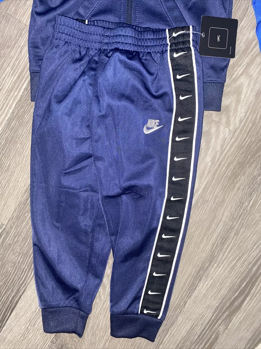 Blue nike cheap tape tracksuit