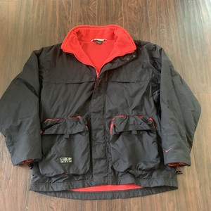 black lined windbreaker